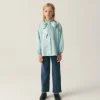 camisa_de_nia_oversize_co_0-1.webp Camisa de niña oversize con lazada azul-MINI Best Sale