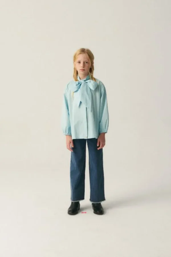 camisa_de_nia_oversize_co_0-1.webp Camisa de niña oversize con lazada azul-MINI Best Sale