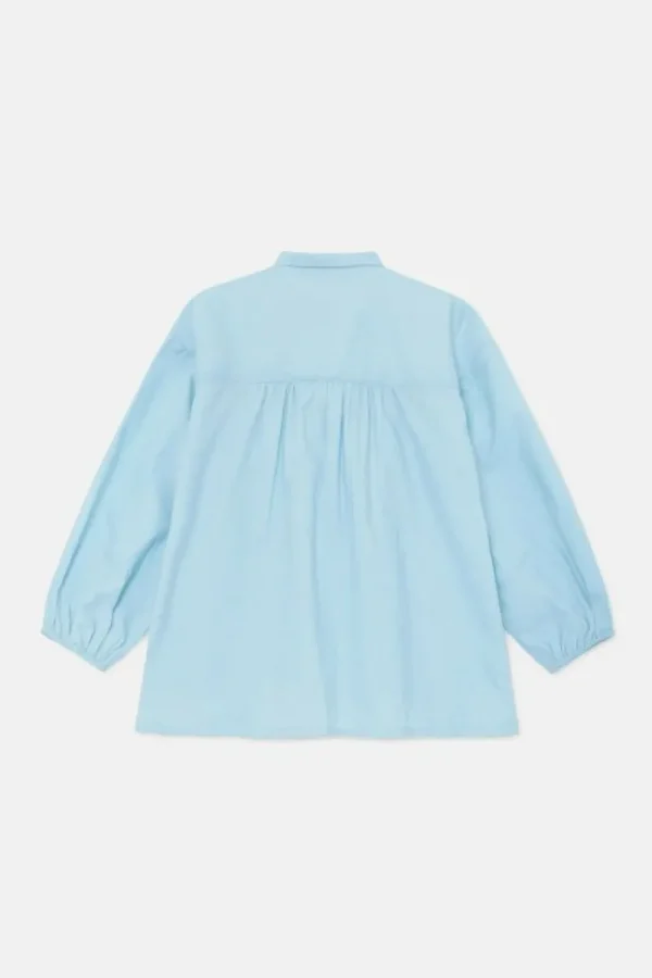 camisa_de_nia_oversize_co_4-1.webp Camisa de niña oversize con lazada azul-MINI Best Sale