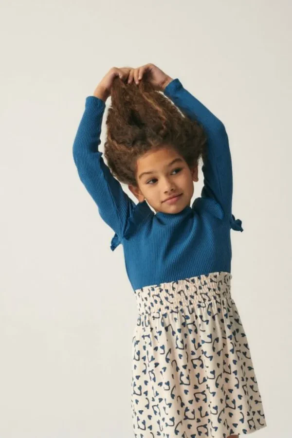 falda_corta_de_nia_con_es_0-1.webp Falda corta de niña con estampado de corazones-MINI Shop