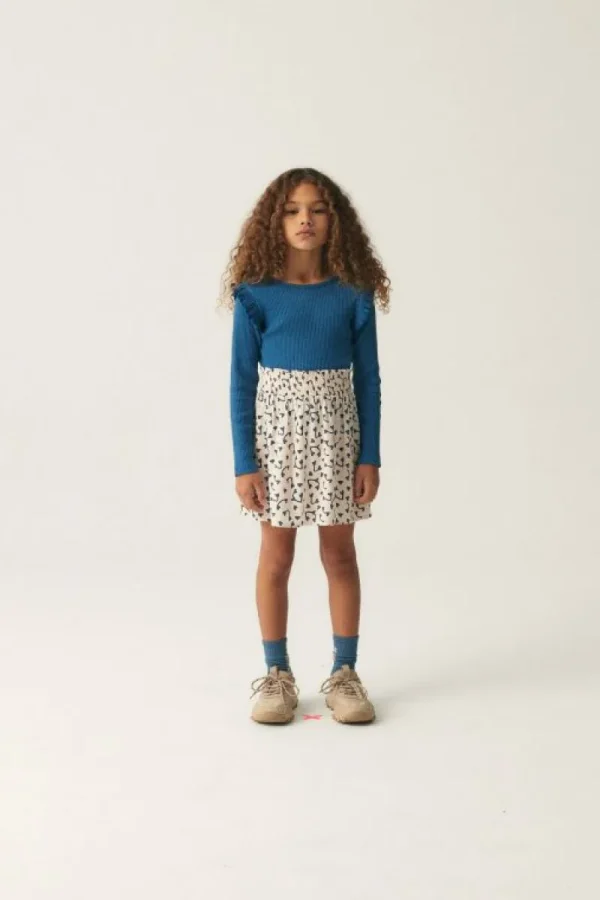 falda_corta_de_nia_con_es_3-1.webp Falda corta de niña con estampado de corazones-MINI Shop