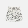 falda_corta_de_nia_con_es_4-1.webp Falda corta de niña con estampado de corazones-MINI Shop