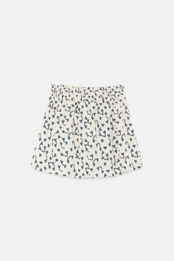 falda_corta_de_nia_con_es_4-1.webp Falda corta de niña con estampado de corazones-MINI Shop