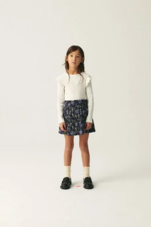 falda_corta_de_nia_en_vis_0-1.webp Falda corta de niña en viscosa LENZING™ ECOVERO™ con estampado floral azul-MINI Best Sale