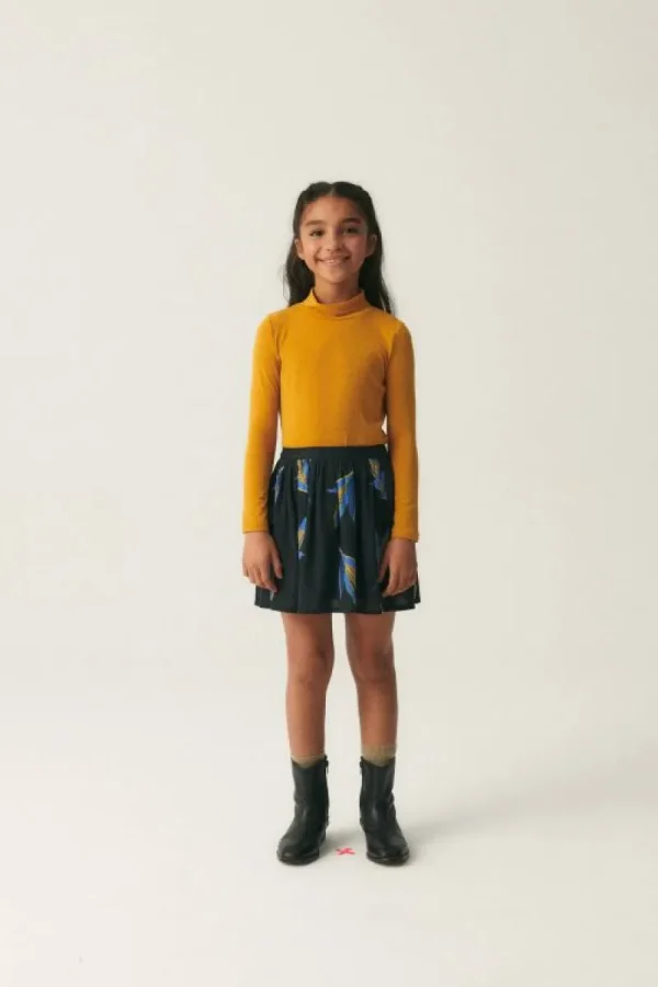 falda_corta_de_nia_en_vis_3.webp Falda corta de niña en viscosa LENZING™ ECOVERO™ con estampado de mazorcas-MINI Cheap