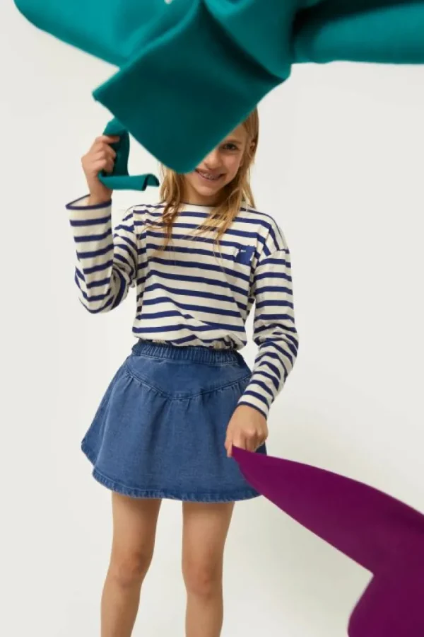 falda_corta_de_nia_vaquer_3-2.webp Falda corta de niña vaquera azul-MINI Store