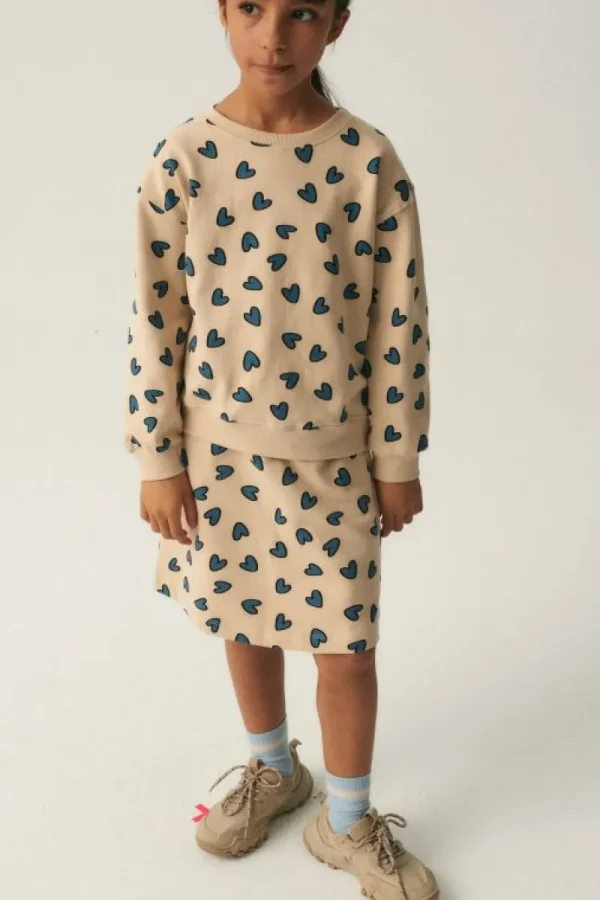 falda_midi_de_nia_con_est_0.webp Falda midi de niña con estampado de corazones-MINI Sale