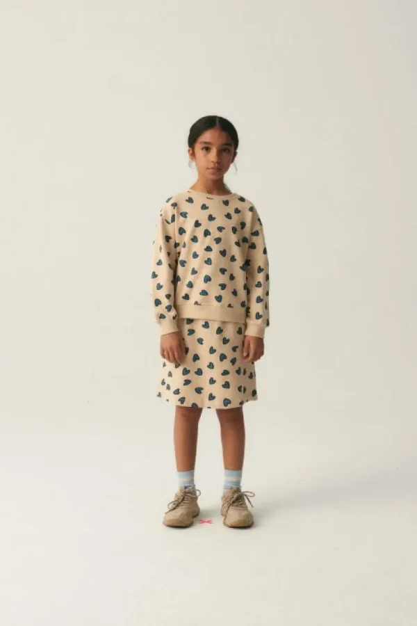 falda_midi_de_nia_con_est_3.webp Falda midi de niña con estampado de corazones-MINI Sale