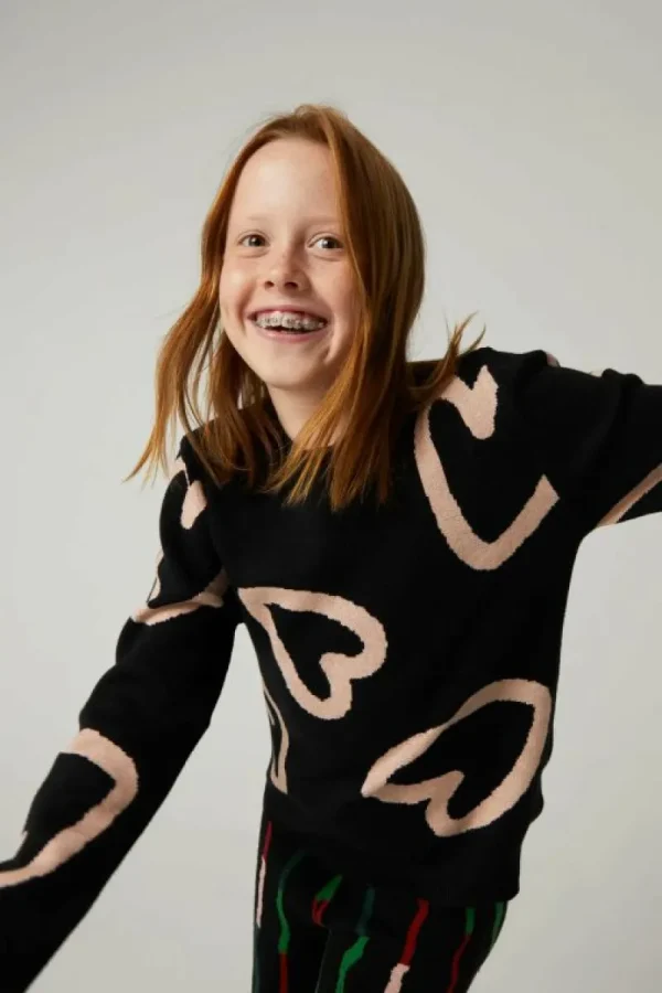 jersey_unisex_de_punto_co_2.webp Jersey unisex de punto con estampado de corazones-MINI Best Sale