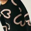 jersey_unisex_de_punto_co_5.webp Jersey unisex de punto con estampado de corazones-MINI Best Sale