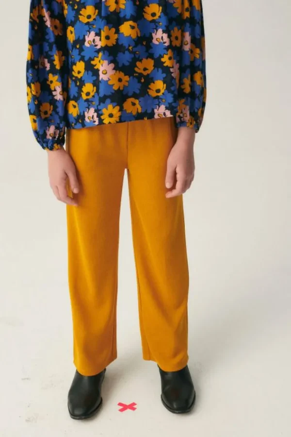 pantaln_de_nia_largo_elst_2-1.webp Pantalón de niña largo elástico amarillo-MINI Shop