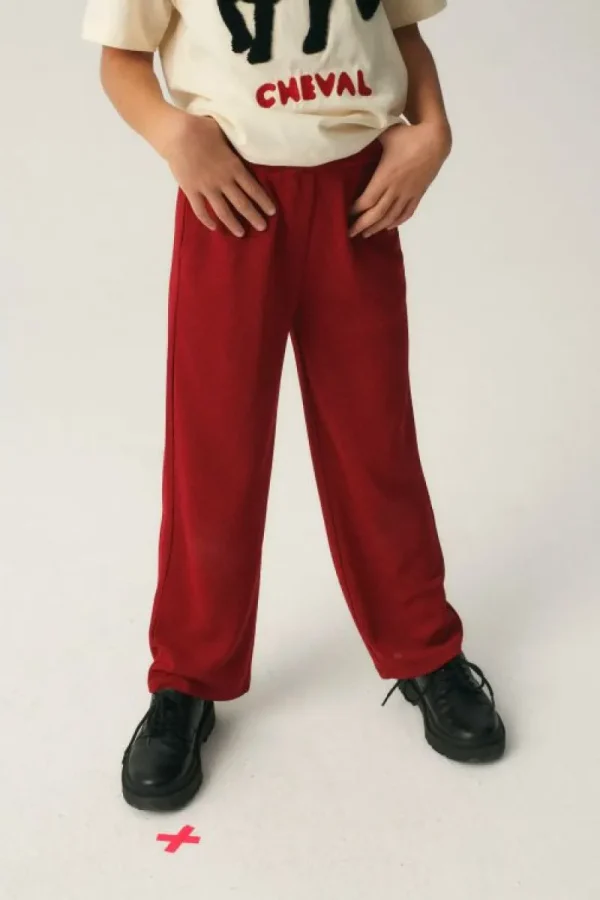 pantaln_de_nia_largo_elst_2.webp Pantalón de niña largo elástico granate-MINI Store