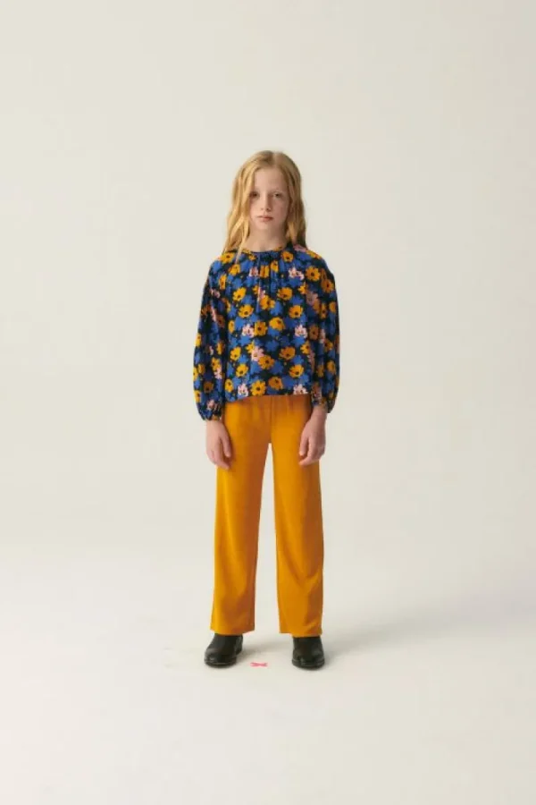 pantaln_de_nia_largo_elst_3-1.webp Pantalón de niña largo elástico amarillo-MINI Shop