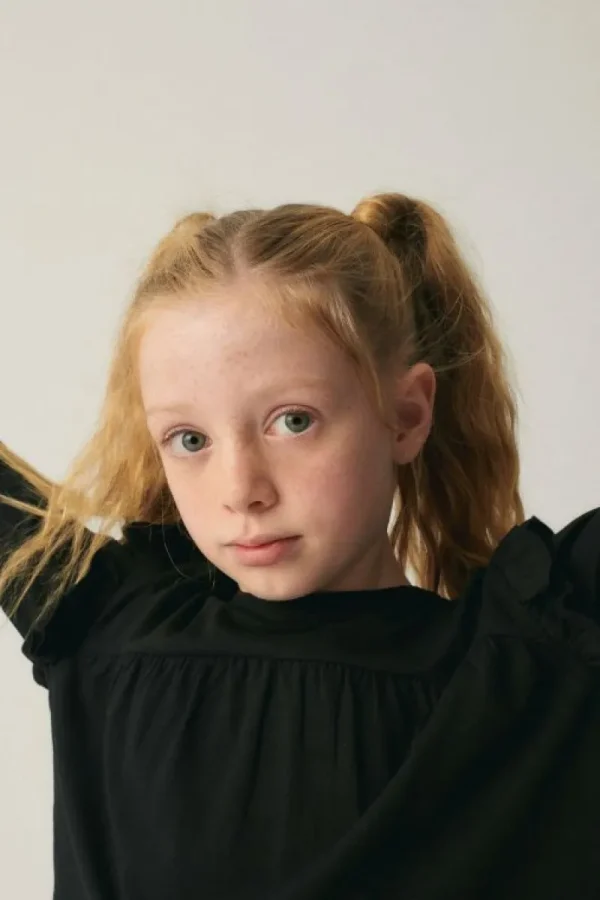 top_de_nia_con_volantes_n_3.webp Top de niña con volantes negro-MINI Shop