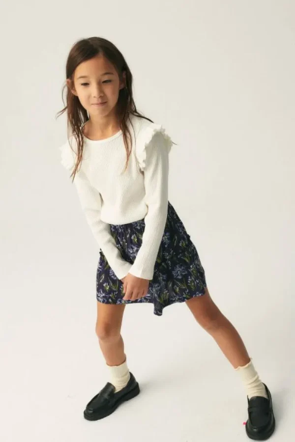 top_de_nia_en_punto_canal_0-2.webp Top de niña en punto canalé blanco-MINI Best