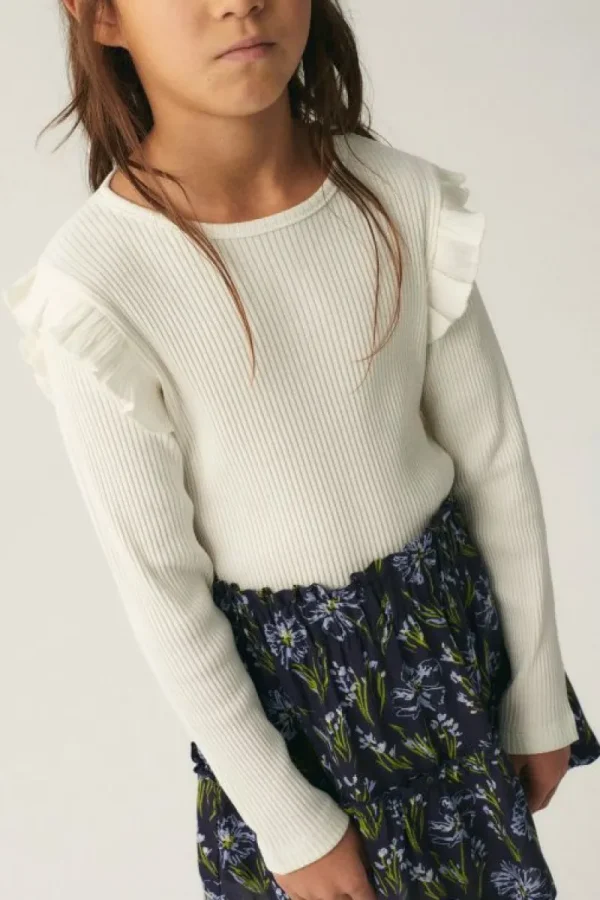 top_de_nia_en_punto_canal_2-2.webp Top de niña en punto canalé blanco-MINI Best