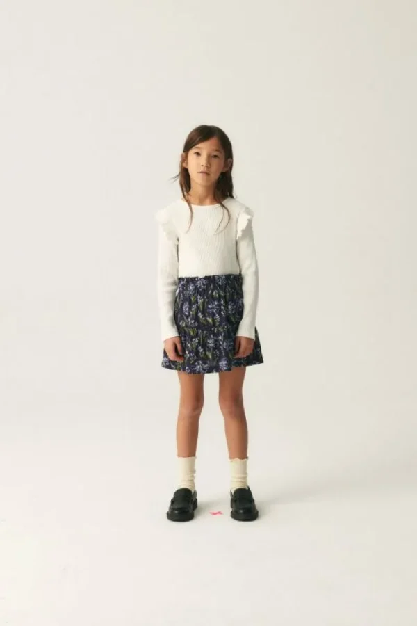 top_de_nia_en_punto_canal_3-2.webp Top de niña en punto canalé blanco-MINI Best