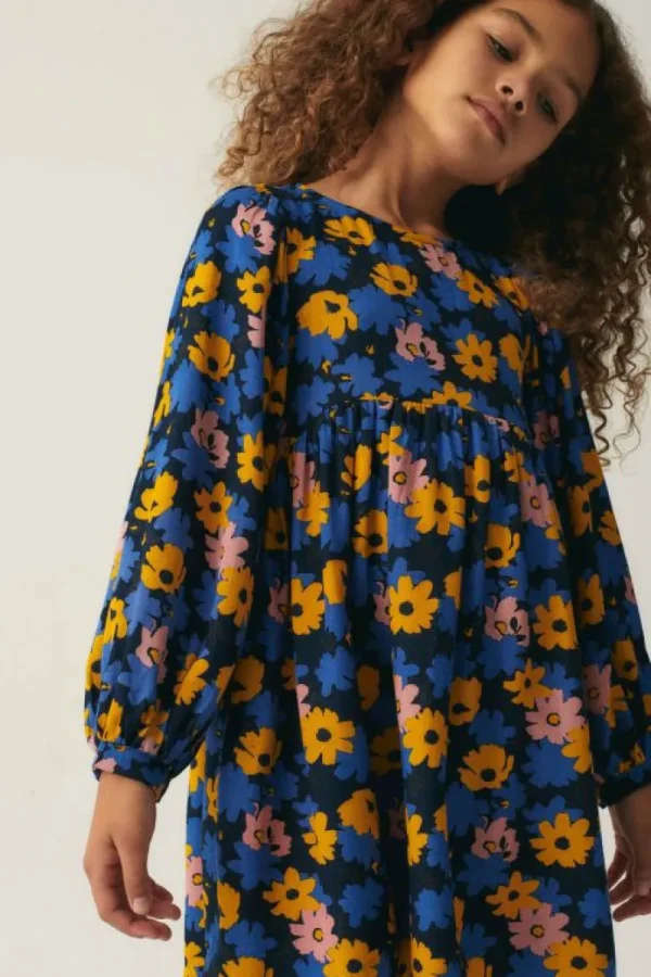 vestido_corto_de_nia_con__0-2.webp Vestido corto de niña con estampado floral-MINI Store